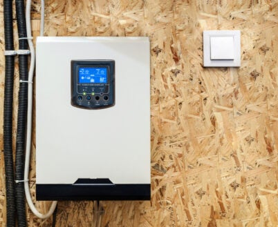 Solar Inverter Hybrid isometric System Controller with Switch. Home Battery Energy Storage located in Garage Wall.