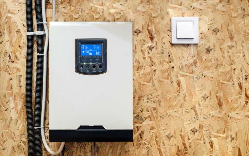 Solar Inverter Hybrid isometric System Controller with Switch. Home Battery Energy Storage located in Garage Wall.